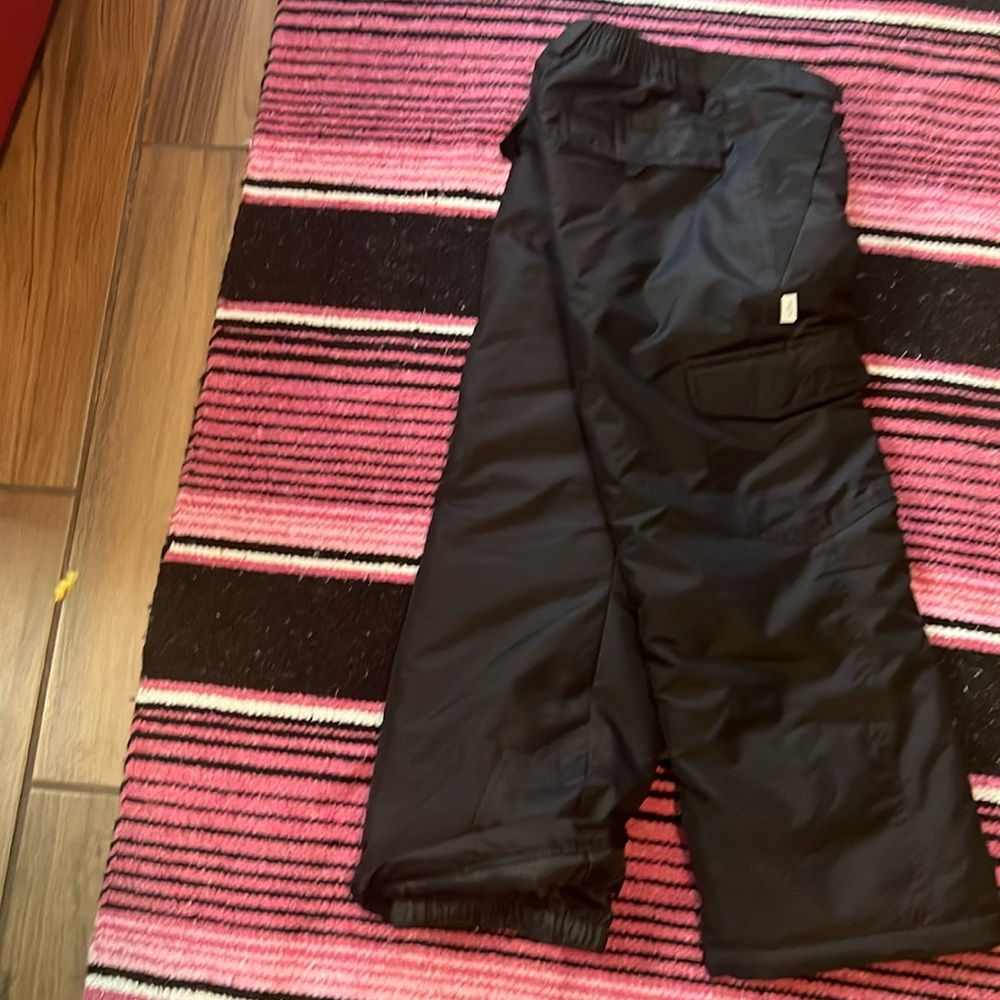Magellan outdoors jouth bogaboo color black no tags never used.